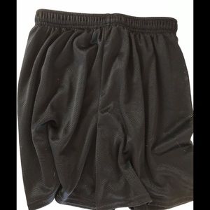 Long plain black soccer shorts
